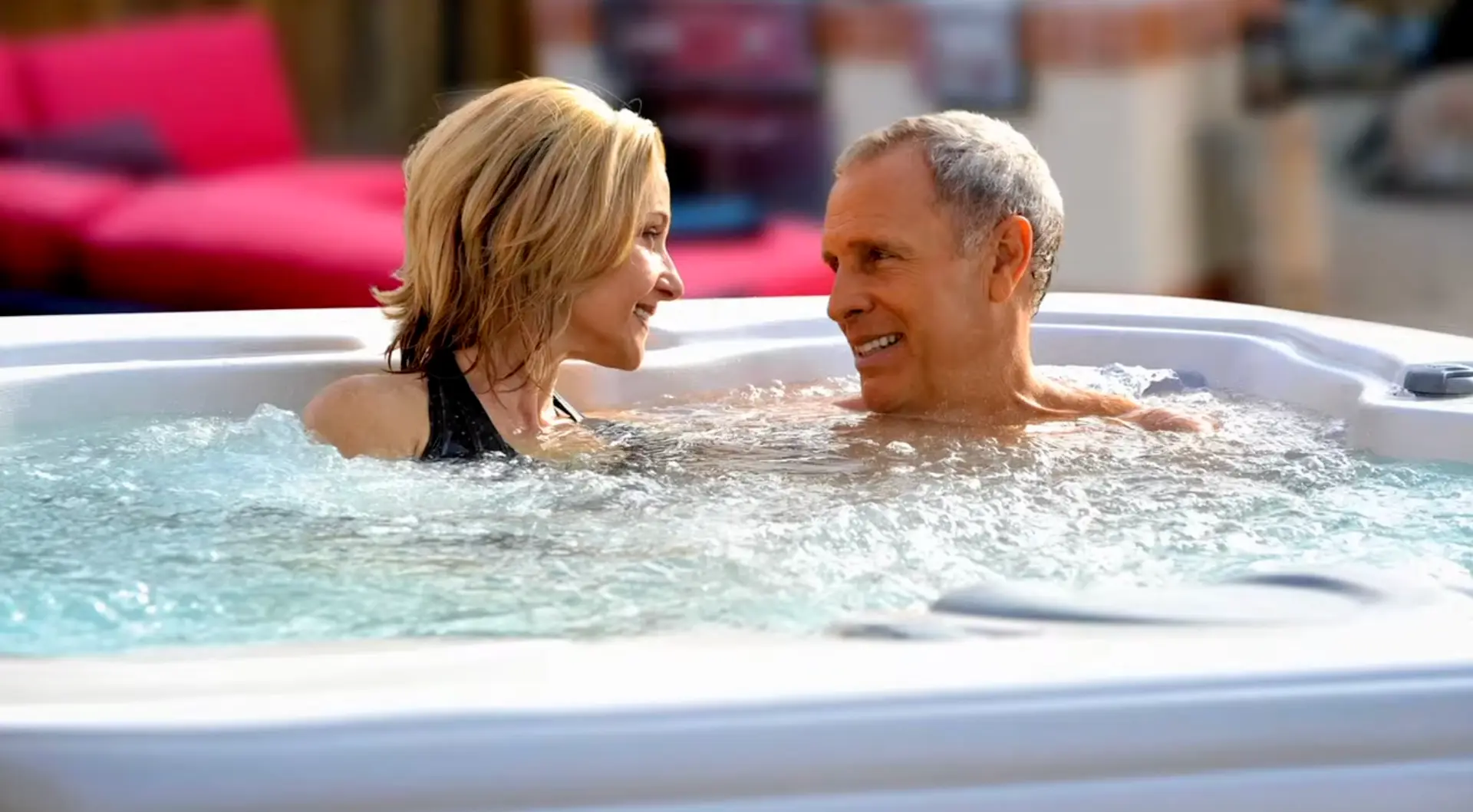 Man and woman in American Whirlpool hot tub